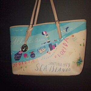 Spartina 449 Sea Islands Tote features a coastal map design of Georgia and Flor